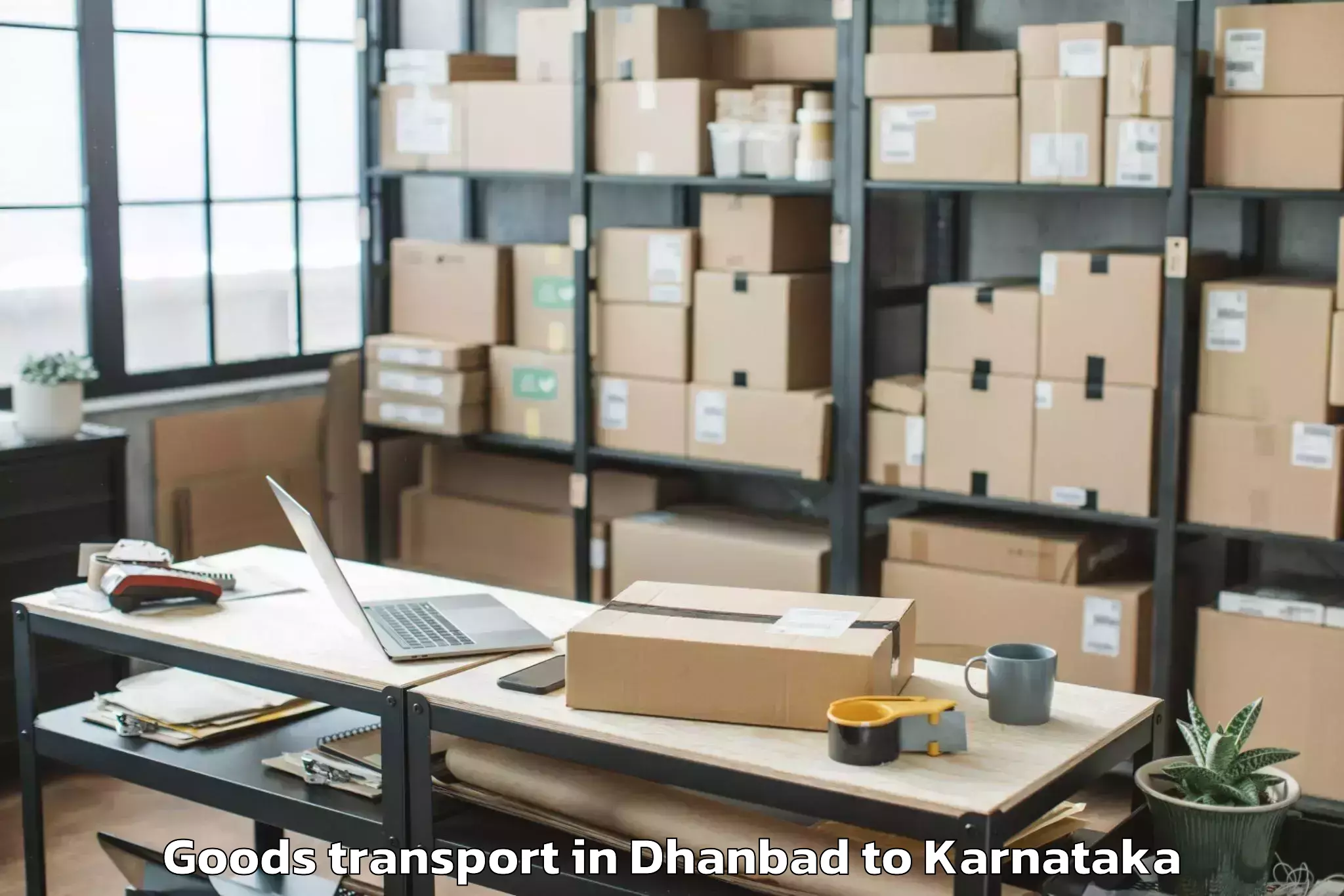 Trusted Dhanbad to Reva University Bangalore Goods Transport